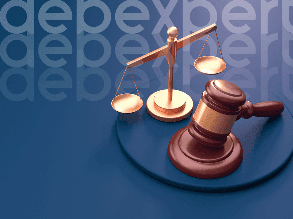 6524f3a500c6950cc090df96_Judge-s-hammer-and-scales-on-the-table.png